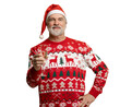 © opolja - Merry mature man wear knitted christmas sweater Santa hat posing, hold glass with champagne look camera isolated on transparent background. Happy New Year 2026 Christmas celebration holiday concept