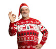 © opolja - Happy charming positive mature man make okay sign recommend, wear knitted christmas sweater and santa hat isolated on transparent background
