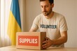 © imagemir - Male volunteer with a Ukrainian flag background, organizing supplies for aid efforts in a focused and determined manner.