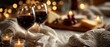© Kate - Romantic evening with red wine, candles, and cozy textures with copy space, Valentine's Day romantic date night, Romantic wine and candlelight setting with cheese