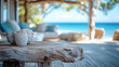 © CrazeePixelINC - Rustic driftwood table and blurred beach house interior background