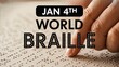 © Zee - Hands reading braille text for world braille day awareness