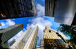 © ungvar - Looking up at Manhattan tower tall buildings in New York City area