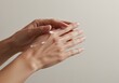 © MdRazaul - Close-up of a Woman s Hands Applying Moisturizing Hand Cream, Focusing on Skincare, Hydration, and Healthy Skin Care Routine