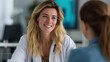 © Keopaserth - Smiling female doctor in white coat talking with patient in bright modern clinic, warm friendly consultation atmosphere and professional medical care