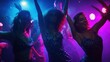 © Dao - Women, dancing and glitter in night club for party, celebration and excited for New Year. Friends, movement and energy on dancefloor for event, disco or birthday social with neon lights for aesthetic