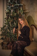 © T.Den_Team - Elegant lady at Christmas eve. Woman at party, holidays concept