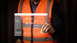 © PRIM - ngineer utilizing stylus pen on virtual screen Chat AI interface. Smart construction worker using artificial intelligence chatbot technology for modern industrial business growth.