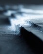 © Chandlerlikes - Conceptual visualization of digital erosion, where a smooth, polished surface is being slowly consumed by fine, detailed patterns of electronic decay and noise.