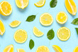 © Pixel-Shot - Cut fresh ripe lemon and leaves on blue background