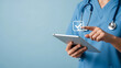 © dipu - Nurse or doctor using a digital tablet with a checklist icon on the screen for medical purposes