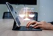 © tete_escape - Concept of AI regulations and digital law with virtual scale of justice icon and circuit appear while hands work with tablet. Ethical AI, legal compliance and technology governance in the digital age.