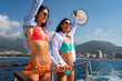 © NDABCREATIVITY - Tourists enjoying the ultimate summer holiday experience, vibrant swimwear and a boat ride