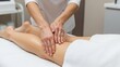 © Tiana_Geo - Woman receiving leg massage from a therapist for relaxation and well-being. Professional and therapeutic body treatment at a spa or clinic. Healthcare