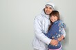 © BillionPhotos.com - Smiling couple by in winter cloth hug