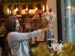 © sittinan - woman relax in cafe and use smartphone