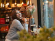 © sittinan - woman relax in cafe and use smartphone