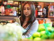 © sittinan - young woman shopping in supermarket