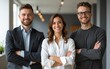 © yuan - Smiling colleagues standing with their arms crossed. High quality