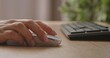 © kinomaster - Close up of Hand Using a Computer Mouse