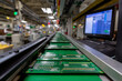 © gunzexx png and bg - A detailed view of a production line showcasing circuit boards being assembled, highlighting the technology and precision involved in modern manufacturing processes.