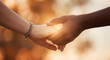 © d3s - A Tender Moment of Connection and Support Between Two People Holding Hands