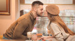 © Pixel-Shot - Happy young couple on romantic date in cafe