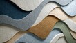 © Newleks - Abstract soundscape layering acoustic felt panels creating a soothing, wavy texture pattern in calming beige, blue, brown, grey, and green earth tones for interior design