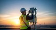 © Margarita Ratatosk - Man technician installing cellular communication equipment on rooftop at sunset. Network engineer configuring 5g antenna for wireless connectivity.