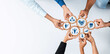 © InfiniteFlow - Hands of diverse individuals working together with gears representing teamwork and strategies in a modern workspace, showcasing collaboration for business success. Amity