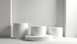 © miss irine - Minimalist scene with white cylindrical podiums of various sizes arranged on plain surface for product placement. Clean background with soft shadows creates modern display space. Simple geometric