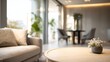 © Fahroni - Soft focus background of stylish empty living room interior with contemporary furniture and neutral light tones. Luxury real estate and home services concept for premium residential property.