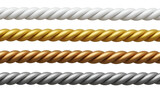 A seamless collection of shiny metallic ropes in silver, gold, bronze, and white on a black background