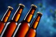 © kardaska - Brown beer bottles with golden caps on blue