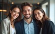© si - Group of business workers smiling happy and confident. Posing together looking at the camera, young handsome man with smile on face at the office. High quality