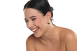 © vladimirfloyd - Studio shot of a laughing woman with dark hair and makeup, showing genuine joy on a white background.