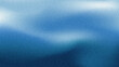 © Rifatho - Grainy dusty background with gradient white and deep blue ocean colors. Blurry and noise texture background, design for banner, widescreen, wallpaper.