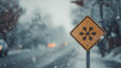 © stasja - Snow warning sign on snowy street during winter snowfall