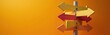 © Viktor - Colorful directional signs on orange background offer choices. Arrows point different ways, symbolizing career or life path decisions. This offers guidance and opportunity.