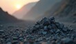 © Viktor - Pile of jagged tungsten ore sits on gravel ground during sunrise. Mountains form distant backdrop under soft morning light. Raw geological material extracted from mine.