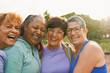 © Sabrina - Group of happy multiracial women smiling on camera after sport workout at city park - Friendship, healthy elderly people and lifestyle concept