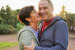© Sabrina - Happy senior couple having tender moment at city park during sunset time - Healthy elderly people and lifestyle concept