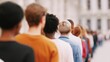 © vlntn - Diverse People Standing In a City Queue