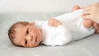 © ADDICTIVE STOCK - Newborn baby lying on back at home