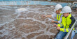 © reewungjunerr - Environmental engineers work at wastewater treatment plants,Water supply engineering working at Water recycling plant for reuse