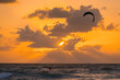 © ADDICTIVE STOCK - Kitesurfing during a vibrant sunset on Tulum beach