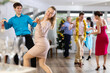 © JackF - Happy people dancing foxtrot during Christmas or New Year celebration