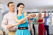 © JackF - Adult man and young woman dancing in dance class