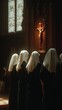 © Zhang - Nuns in Religious Attire Praying in Church