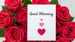 © Momina - Beautiful vibrant red roses frame a white card wishing good morning with sweet hearts below